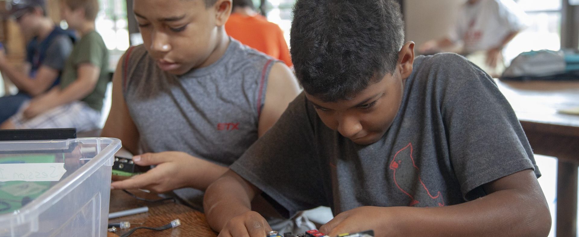 Scout working on robotics