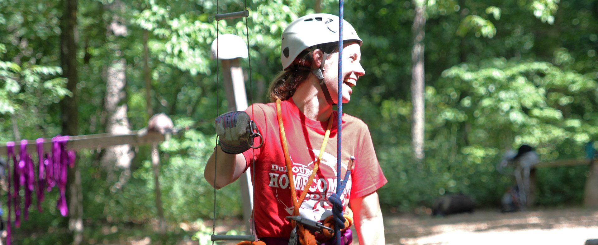 Female scout climbing